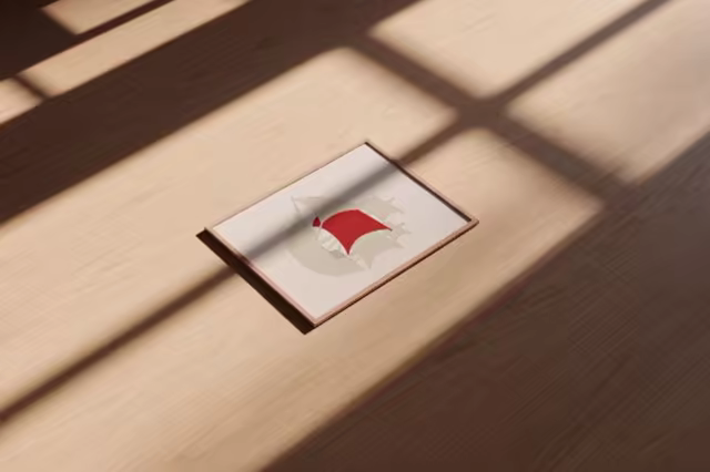 Framed Print Mockup on a Sunlit Wooden Floor