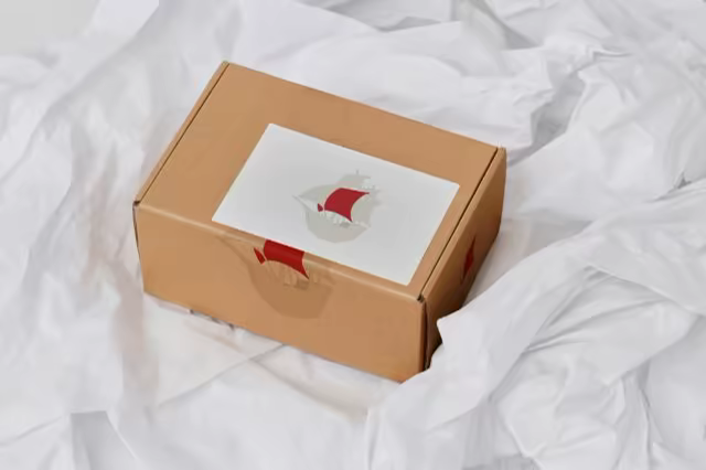 Kraft Mailer Box Mockup on Crumpled Tissue Paper