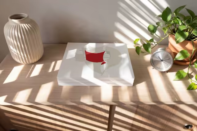 Hardcover Album Mockup on a Sunlit Oak Console