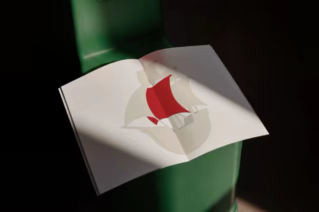 Open Booklet Mockup on a Green Metal Stool