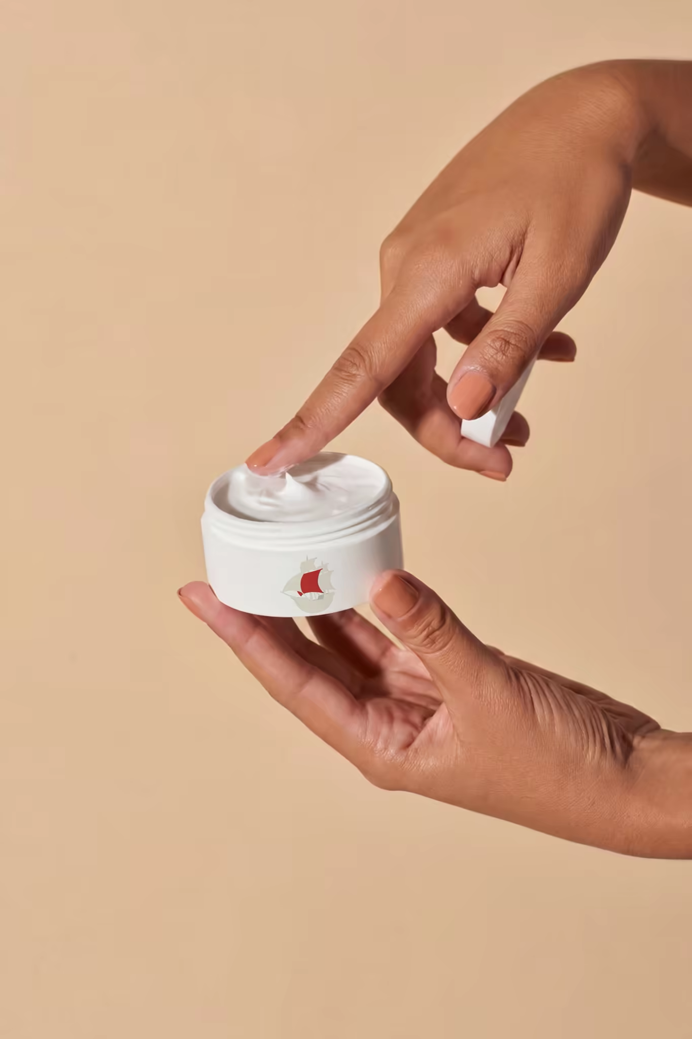 Cream Jar Mockup With a Fingertip Swirl