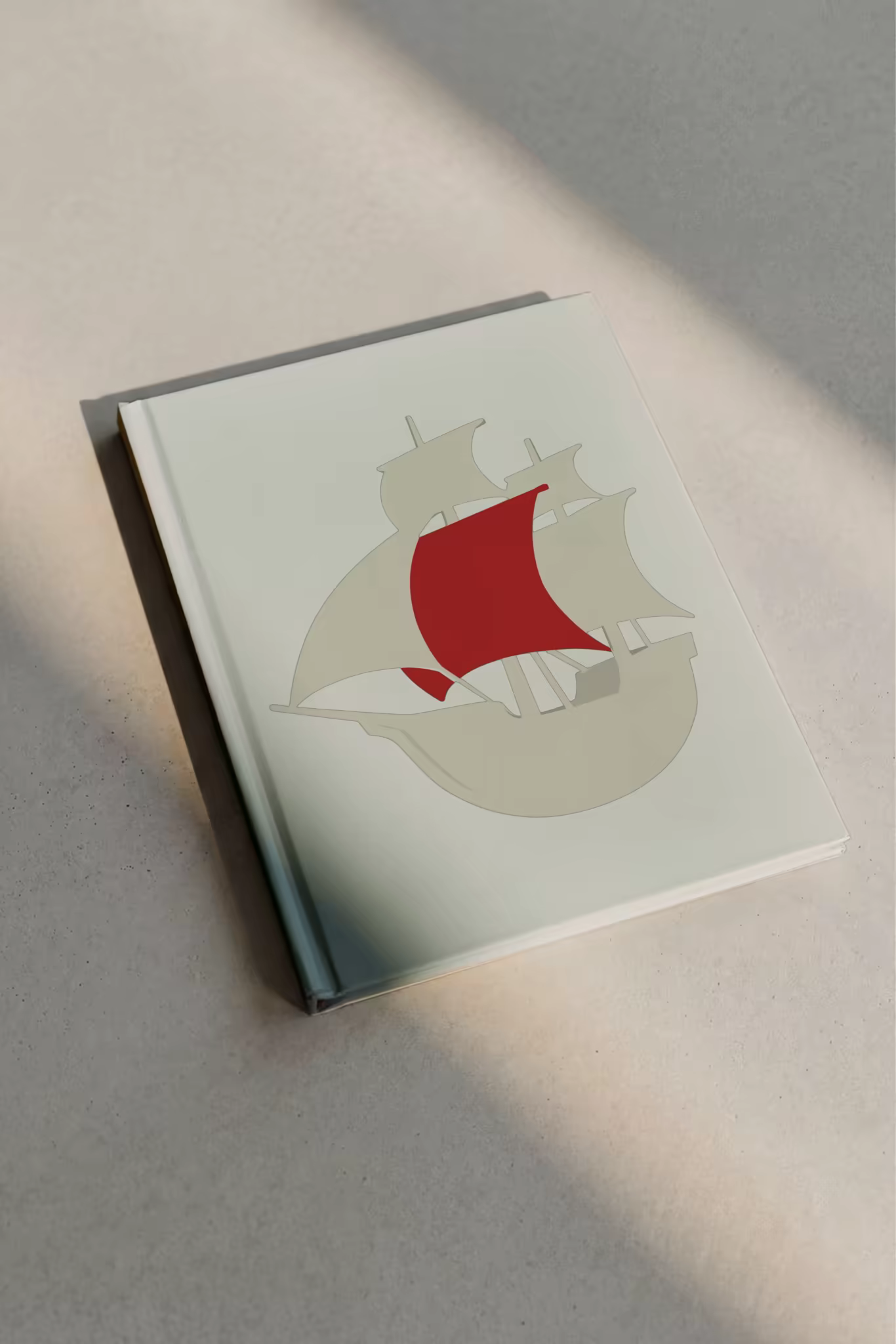 Hardcover Book Mockup in a Warm Floor Sunbeam