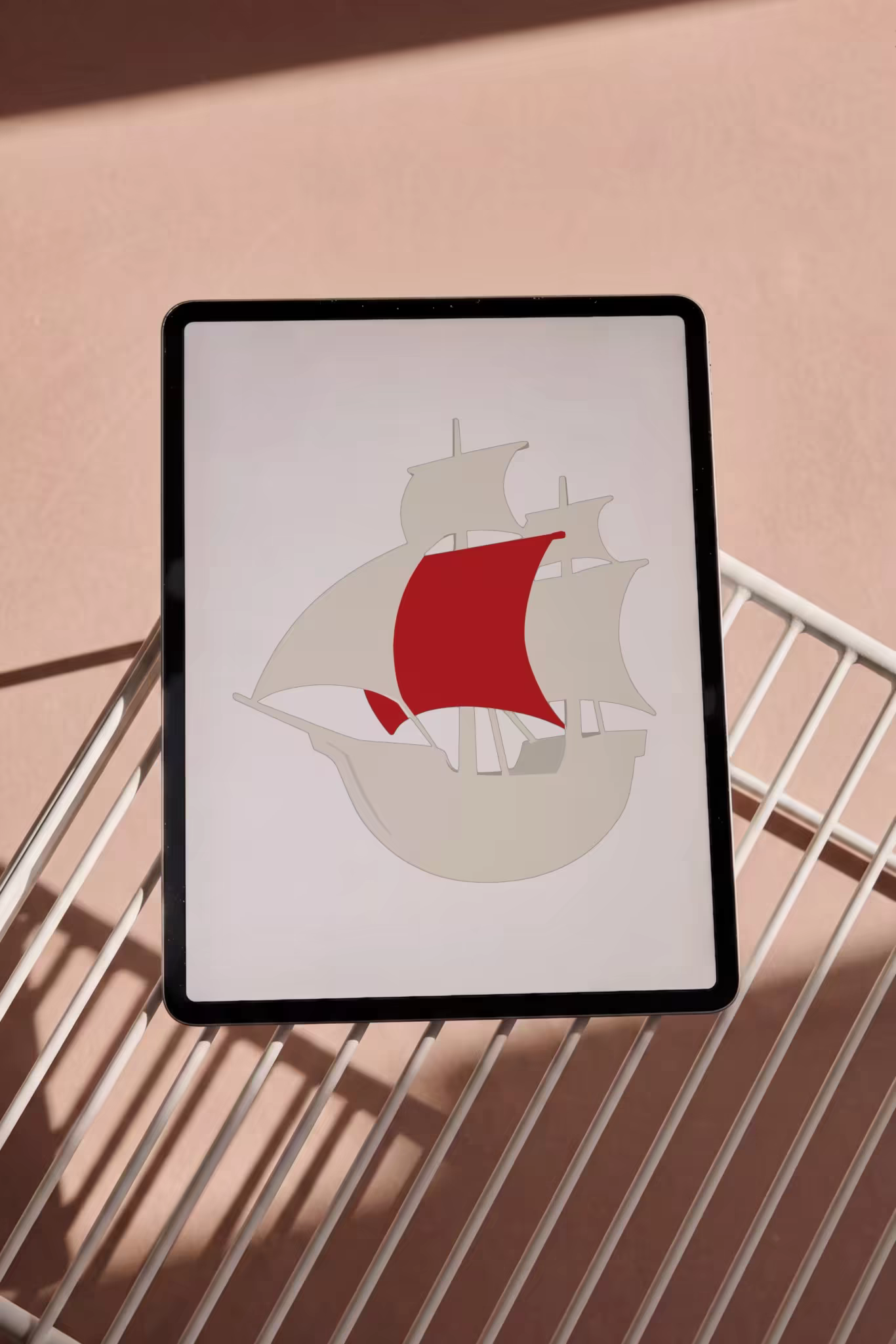 Tablet Mockup on a White Wire Rack in Hard Sunlight