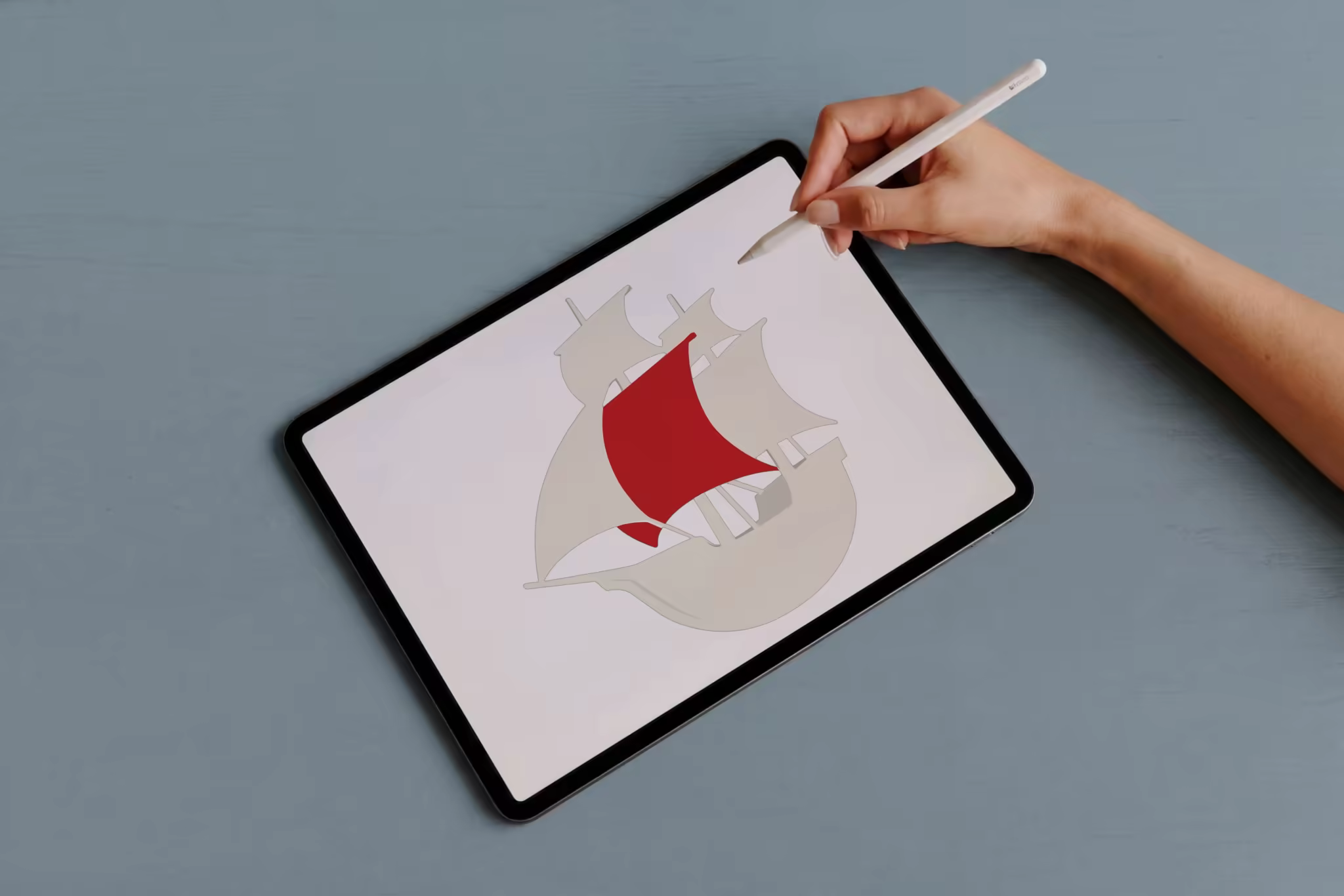 Tablet Mockup With a Stylus on a Dusty Blue Table