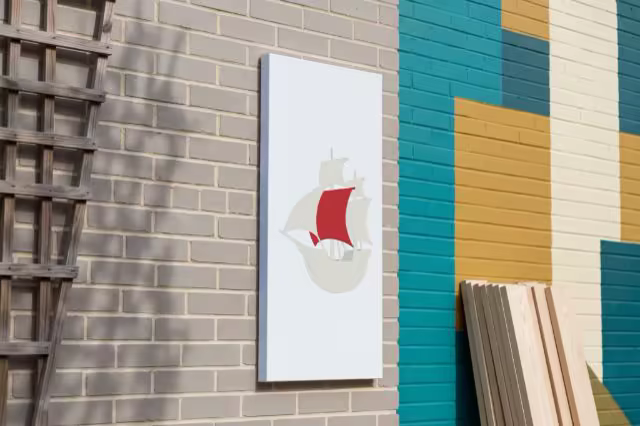 Tall Canvas Mockup on a Gray Brick Wall