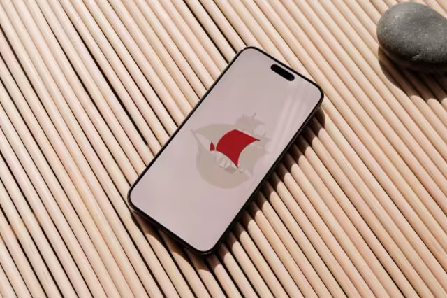 Phone Mockup on a Ribbed Wooden Mat in Warm Sun