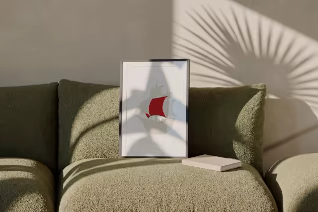 Framed Poster Mockup on an Olive Boucle Sofa