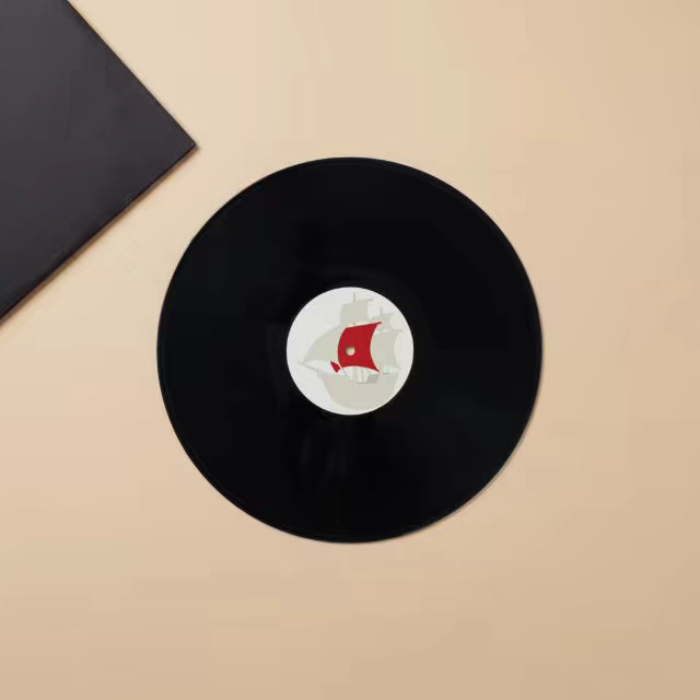 Vinyl Record Label Mockup on a Beige Tabletop