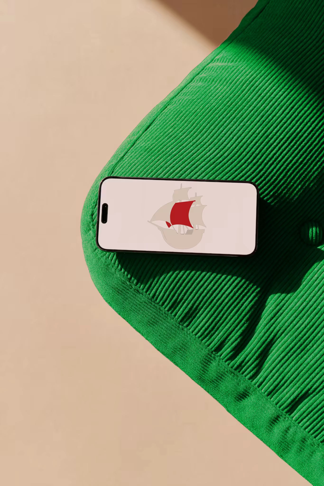 Phone Mockup on a Bright Green Corduroy Cushion