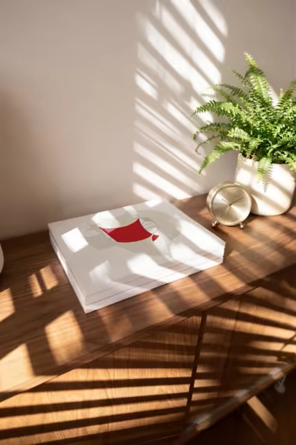 Coffee Table Book Mockup in Striped Window Light