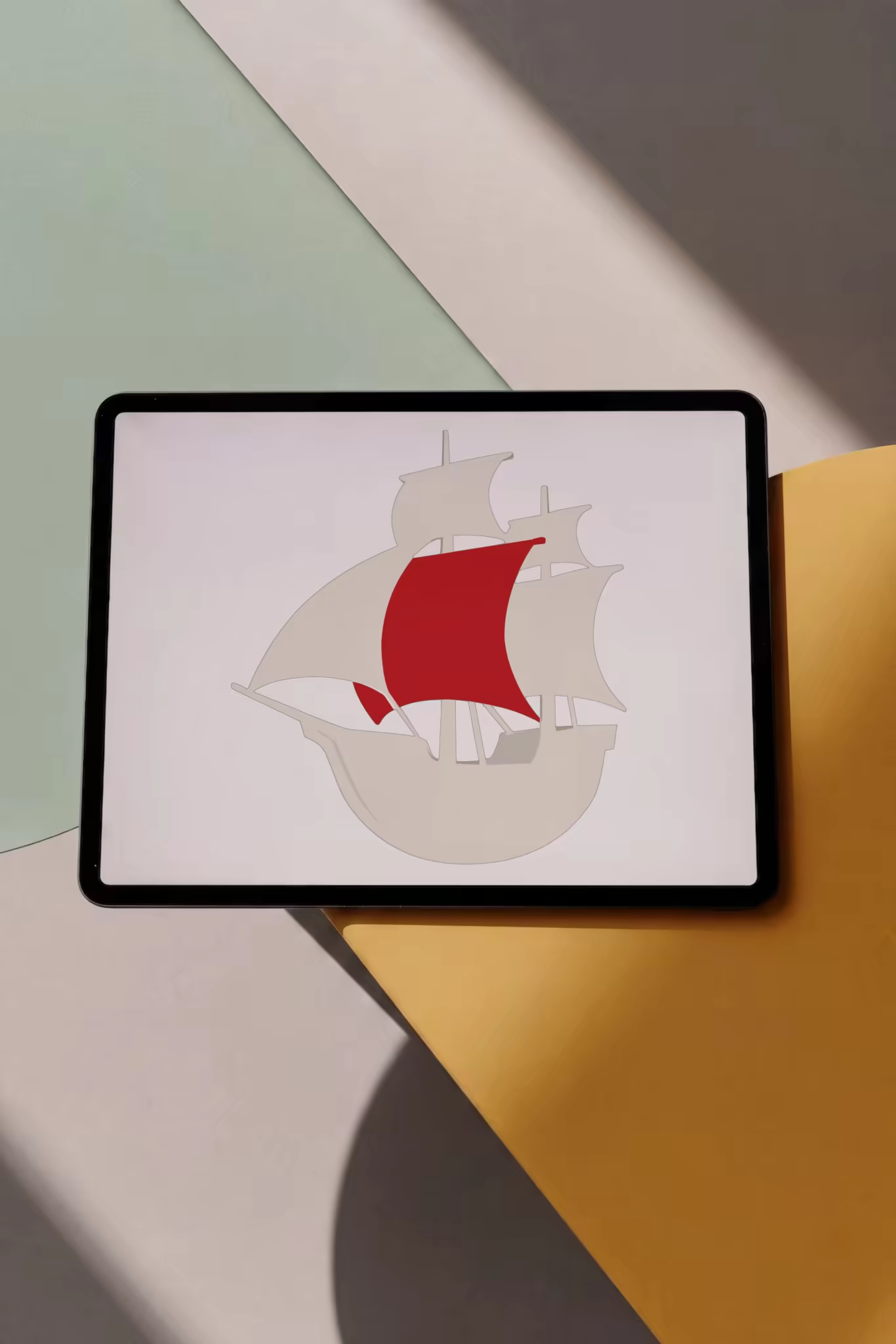 Tablet Mockup on Color-Blocked Paper in Hard Light