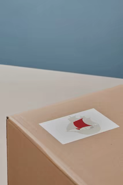 Kraft Shipping Box Mockup With a Corner Label