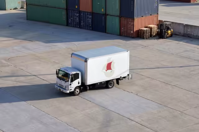 Box Truck Mockup in a Shipping Container Yard