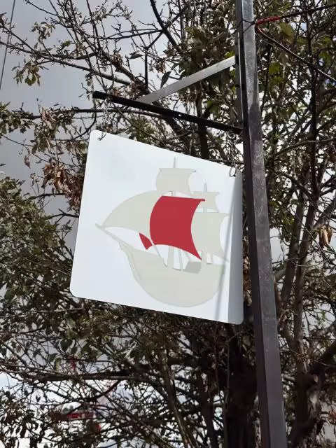 Hanging Signboard Mockup on a Black Bracket