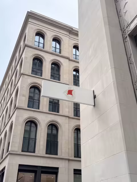 Blade Sign Mockup on a Limestone Building Corner