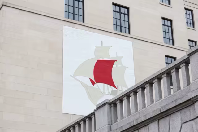 Building Banner Mockup Above a Stone Balustrade