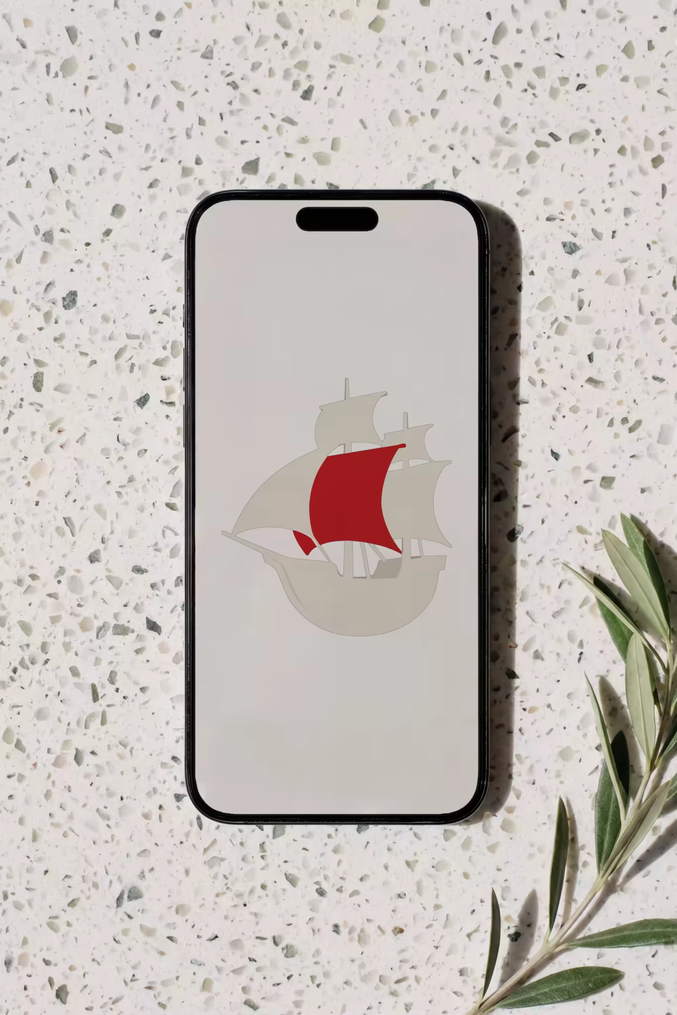 Phone Mockup on Terrazzo With an Olive Branch