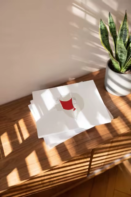 Softcover Stack Mockup on Wood in Window Light