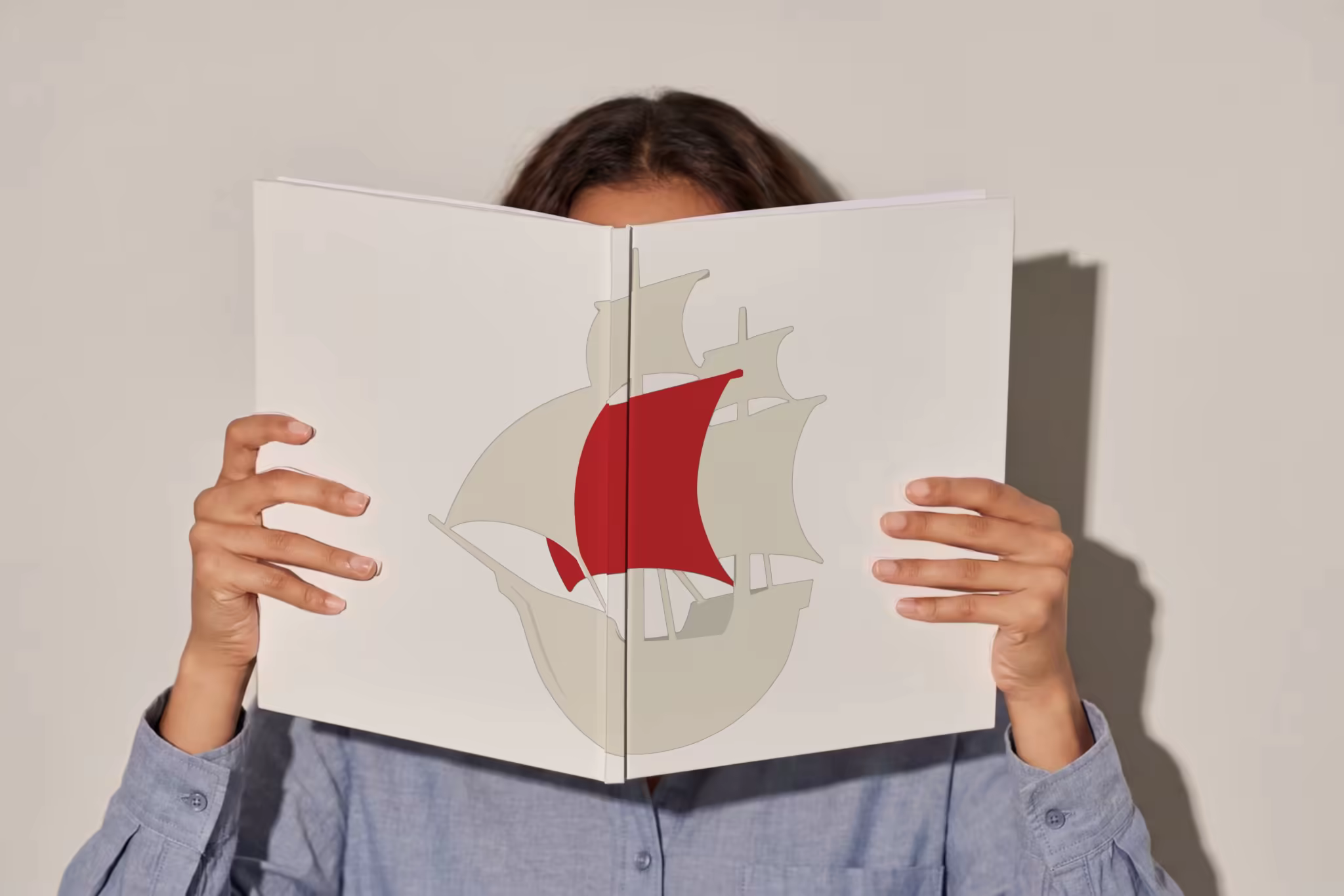 Open Hardcover Book Mockup Held Up by a Reader