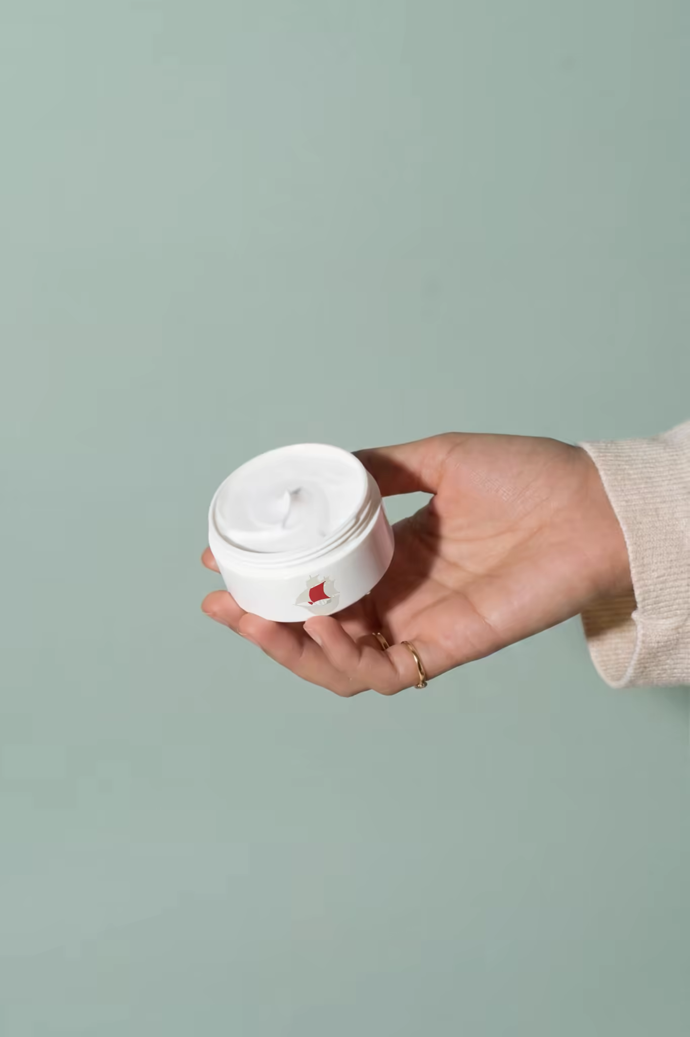 Cream Jar Mockup Held Open in One Hand