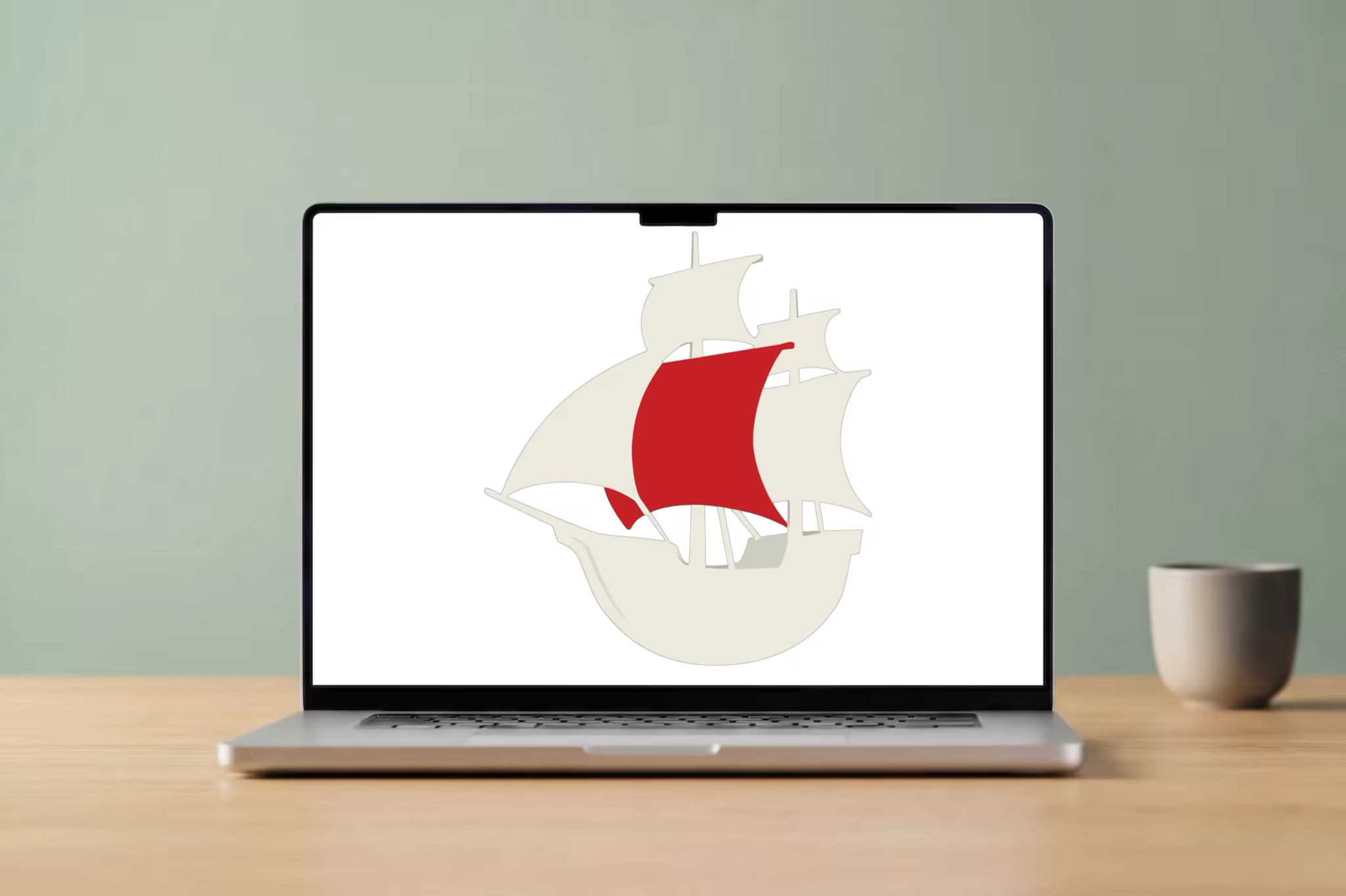 Laptop Mockup on a Light Desk With a Ceramic Cup