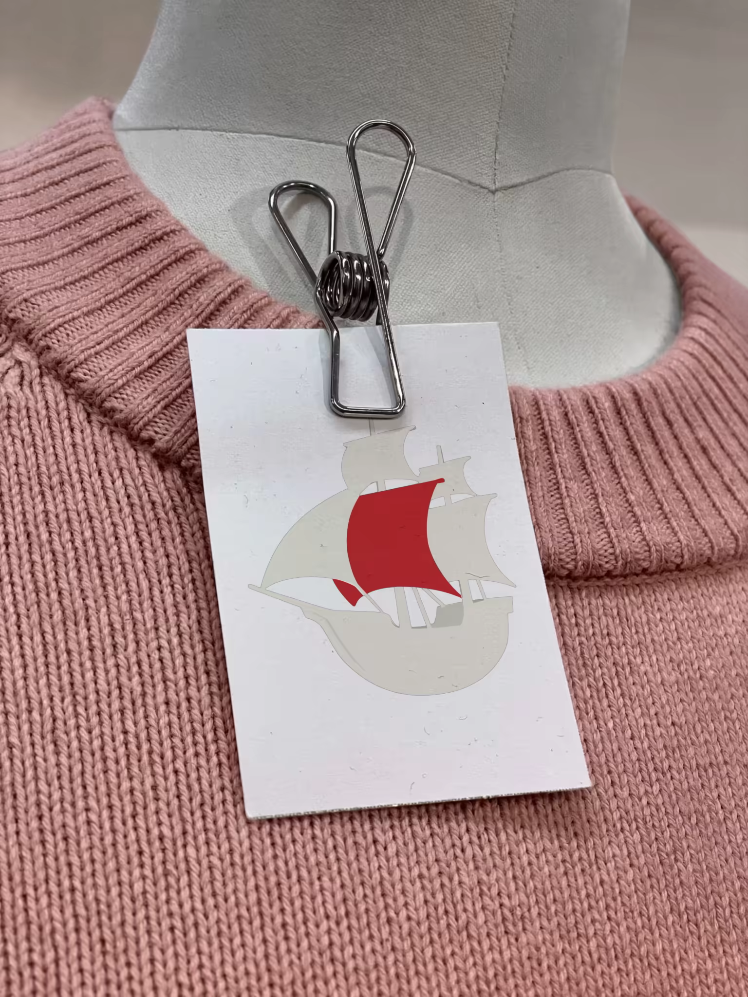 Clipped Card Mockup on a Pink Knit Sweater