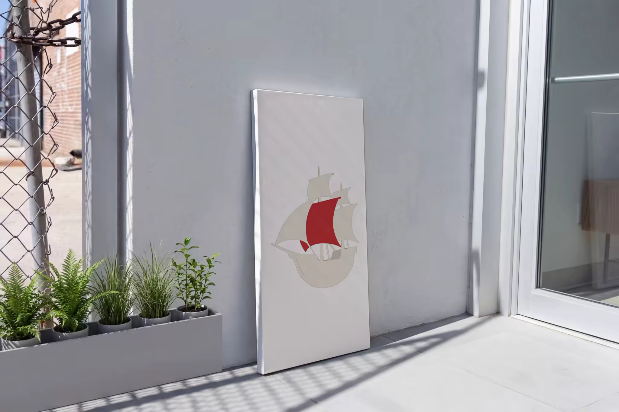 Canvas Print Mockup Leaning by a Glass Door