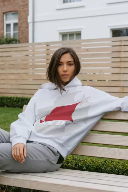 Hoodie Mockup Worn on a Garden Bench