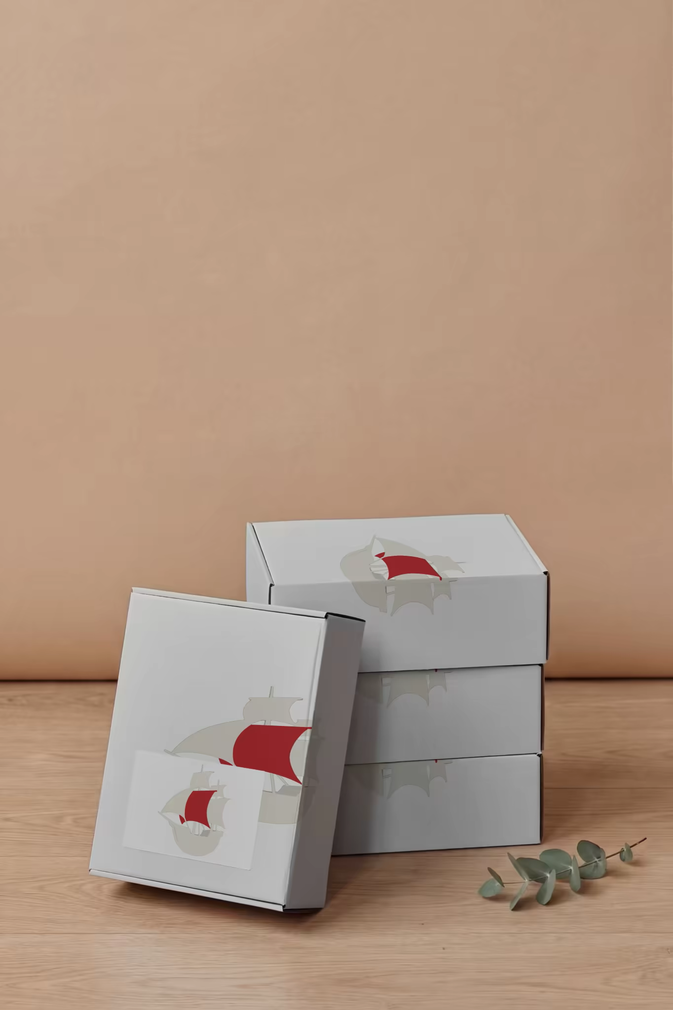 Mailer Box Mockup Stack Against a Peach Wall