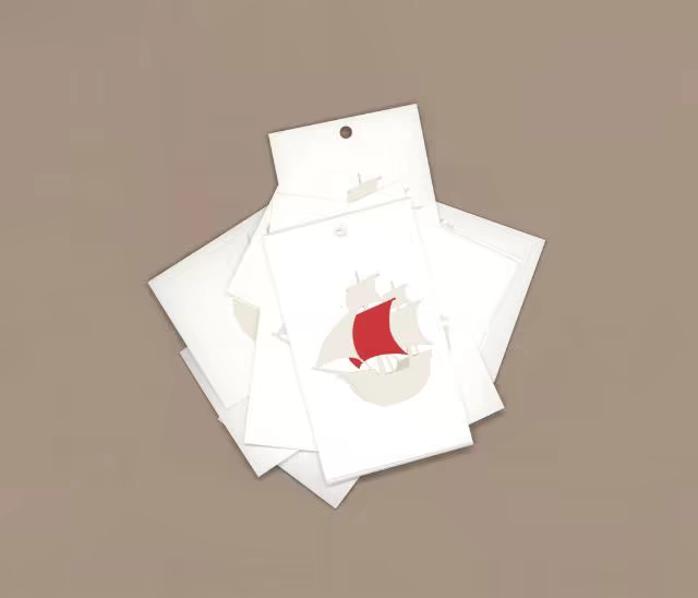 Hang Tag Mockup Pile on a Taupe Backdrop
