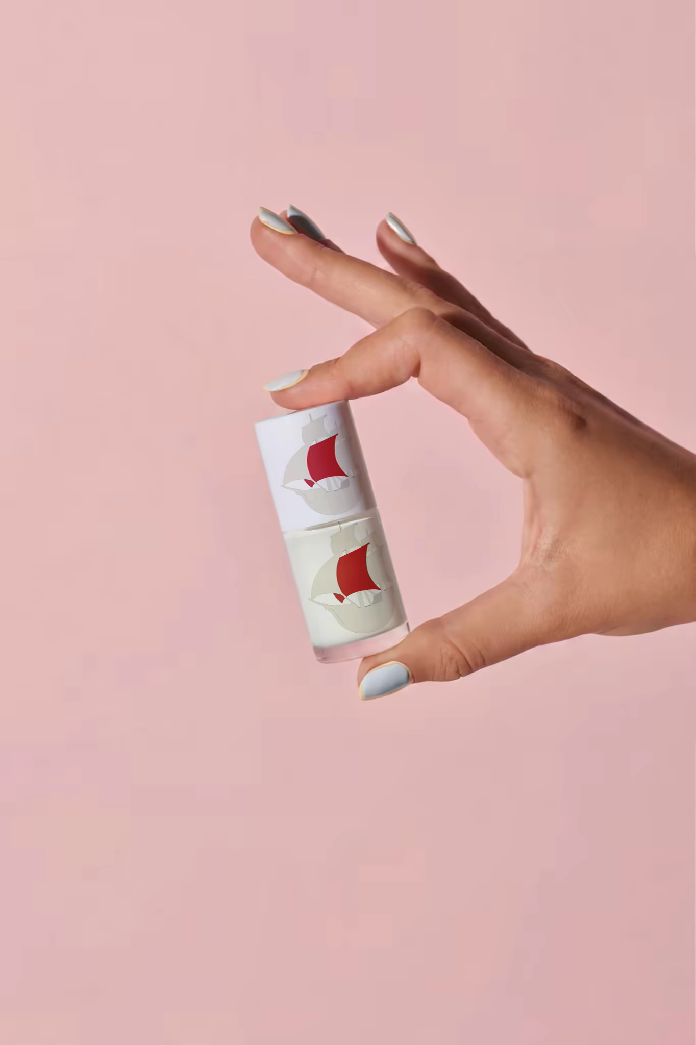 Cosmetic Jar Mockup Held on a Pink Backdrop