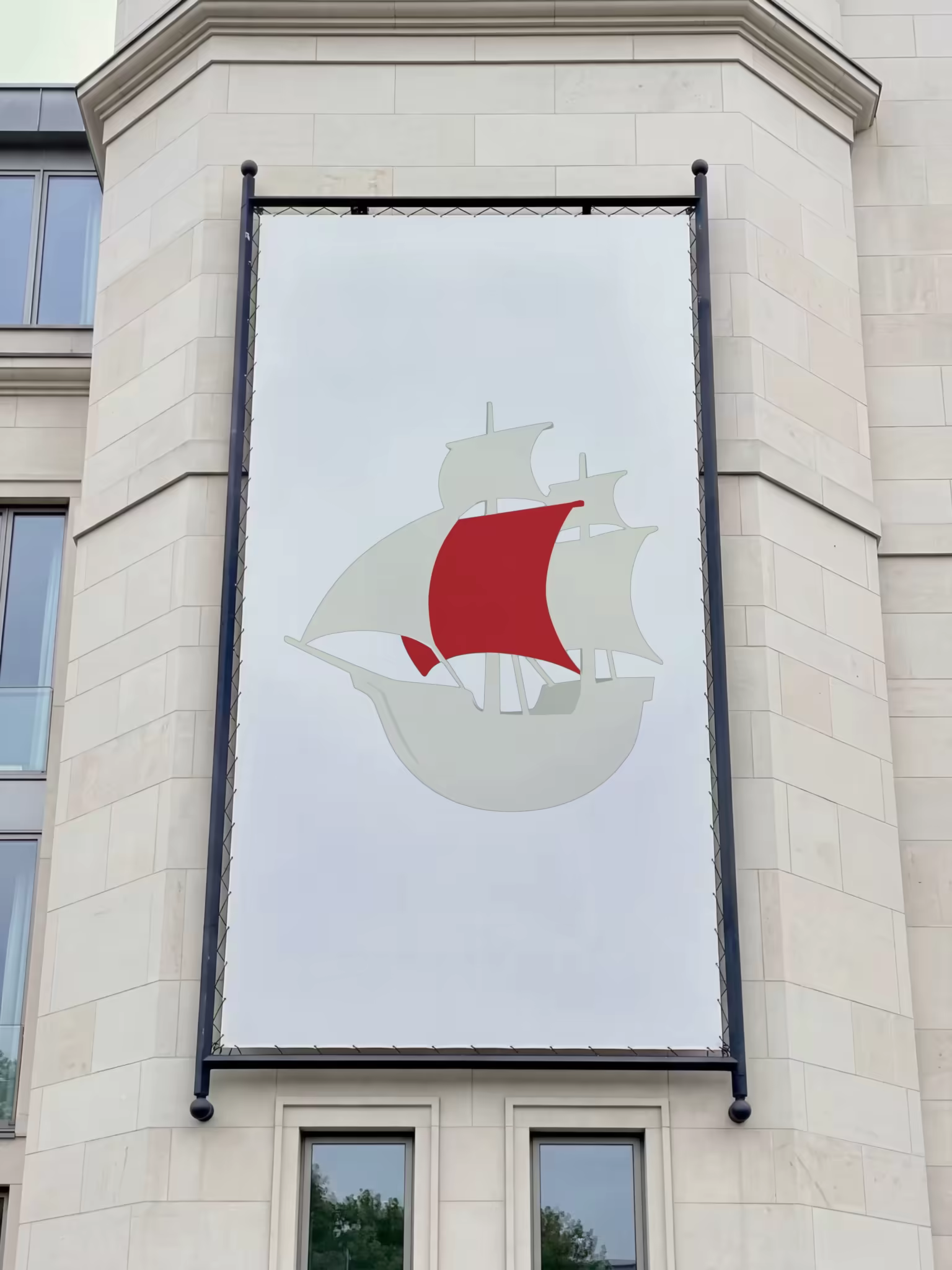 Vertical Banner Mockup on a Limestone Facade