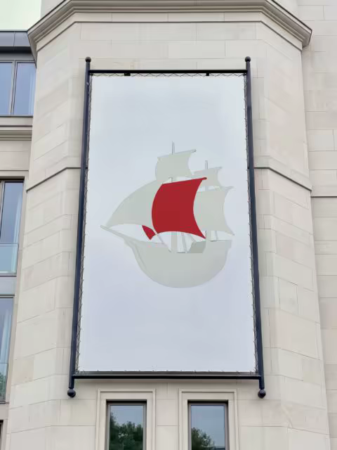 Vertical Banner Mockup on a Limestone Facade