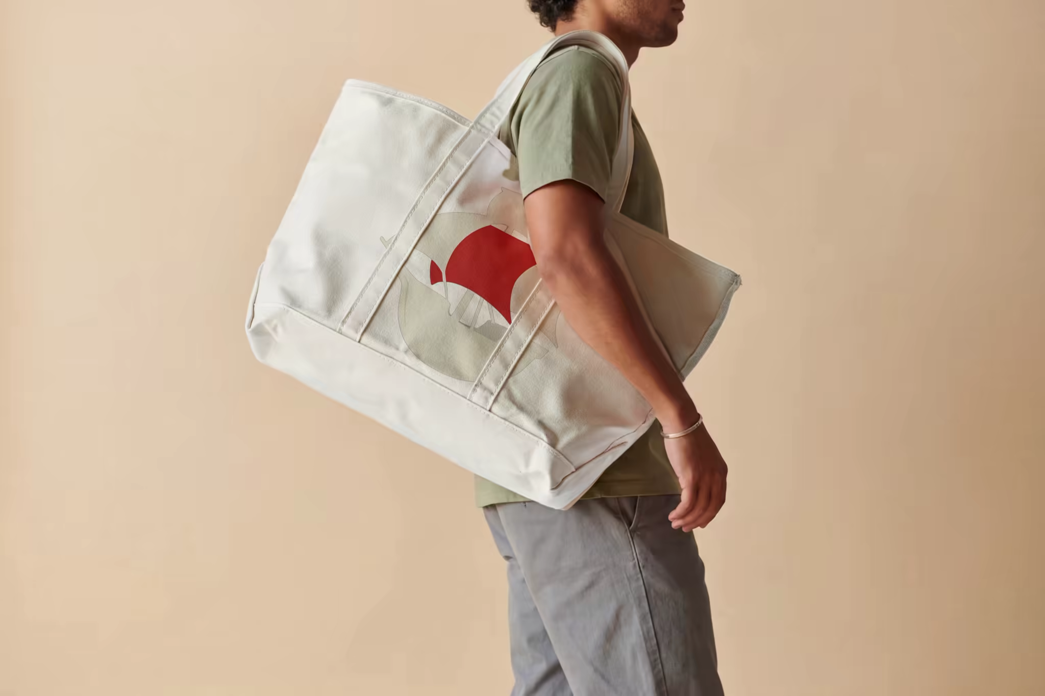 Oversized Canvas Tote Mockup Slung on a Shoulder