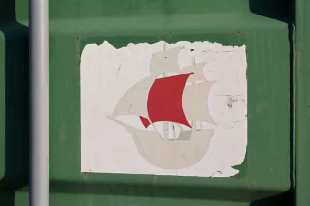 Pasted Poster Mockup on a Green Metal Container