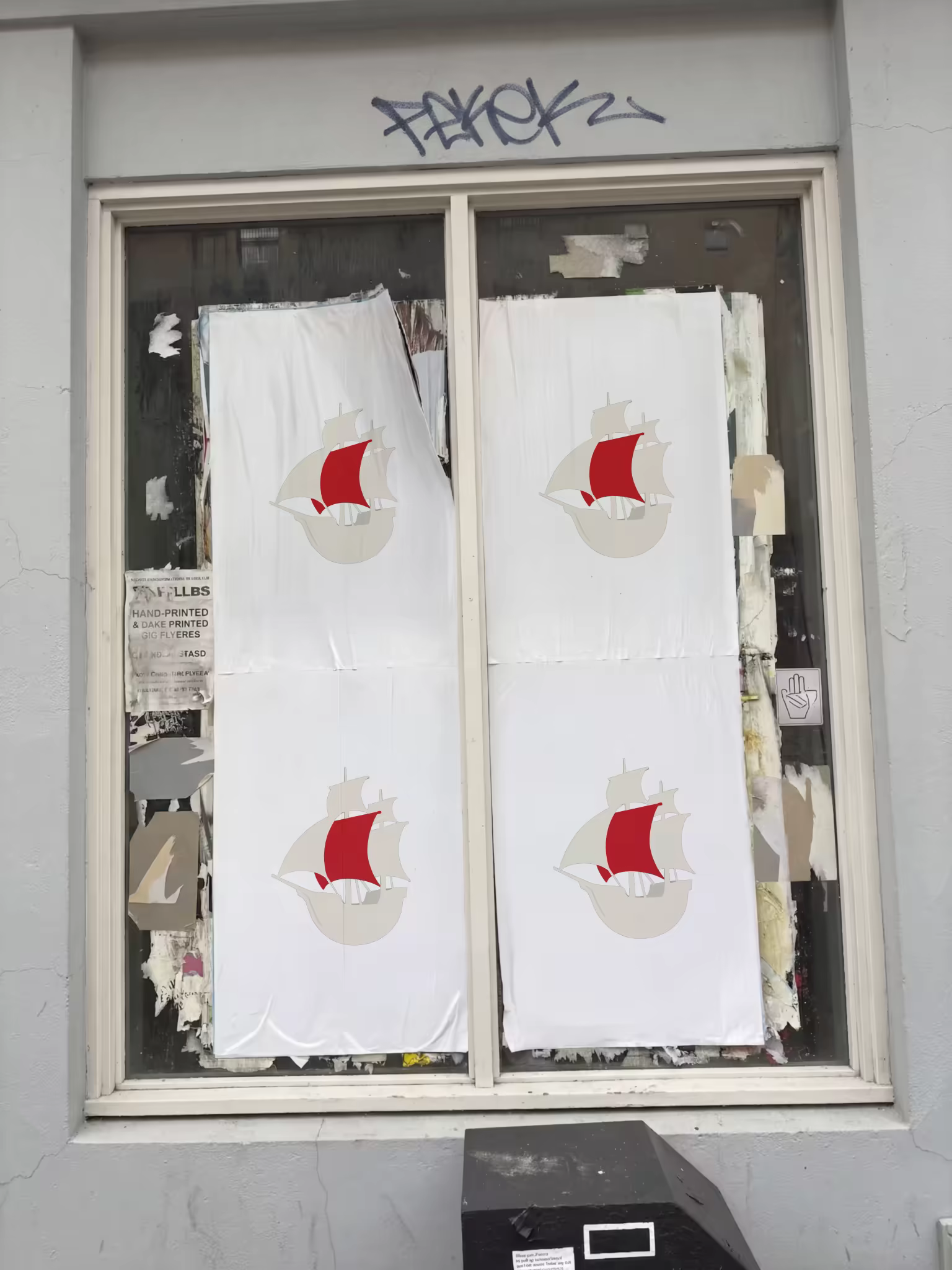 Wheatpaste Poster Mockup in an Old Shop Window