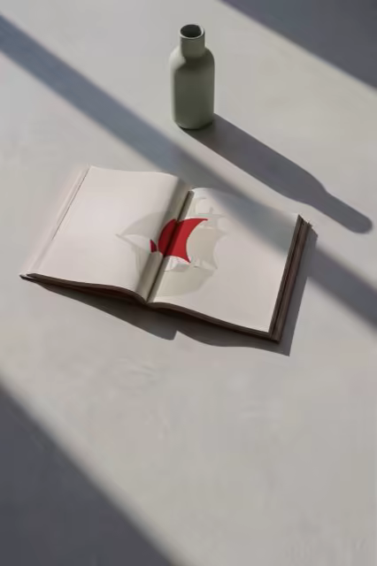 Open Book Mockup on Concrete in Hard Sunlight