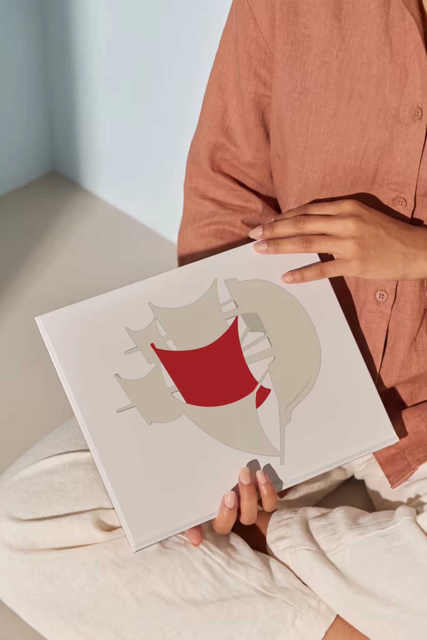 Hardcover Book Mockup Held on a Reader's Lap