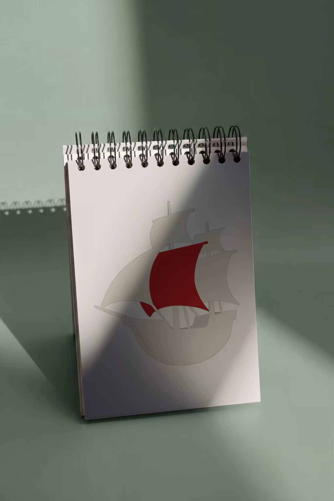 Spiral Notepad Mockup Standing in Dappled Light