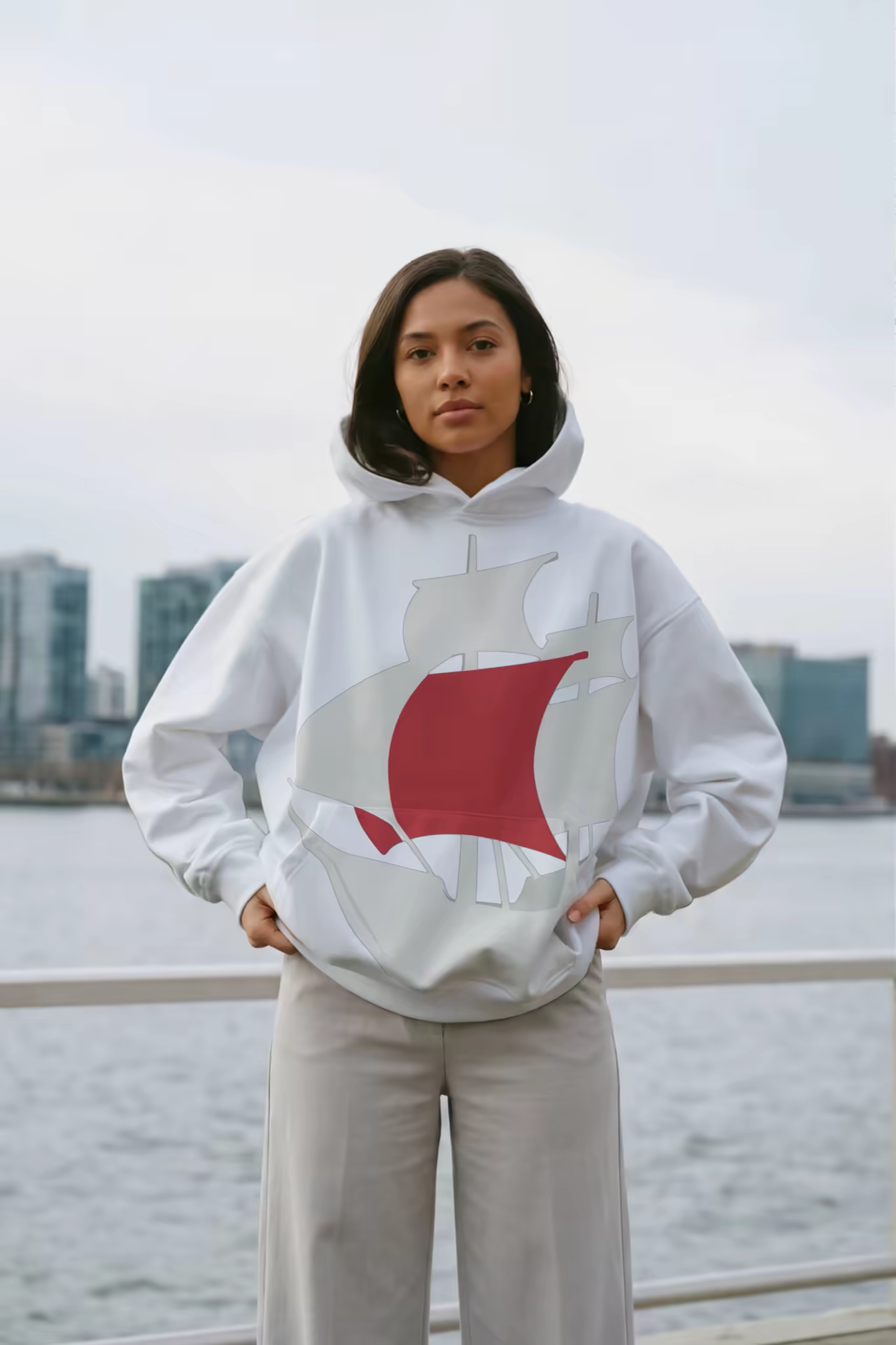 Oversized Hoodie Mockup on a City Waterfront