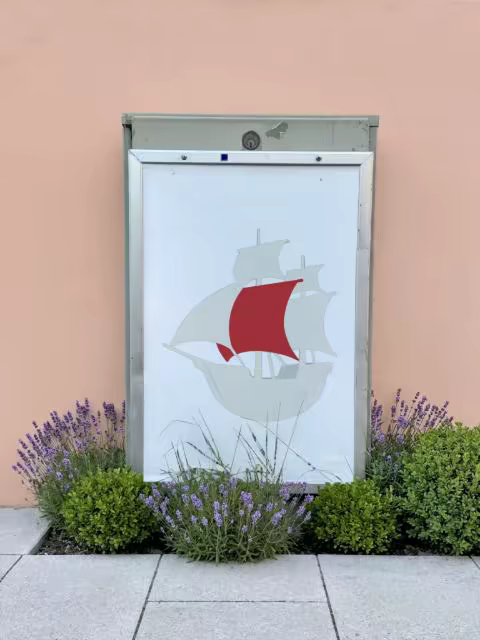 Outdoor Poster Case Mockup on a Peach Wall