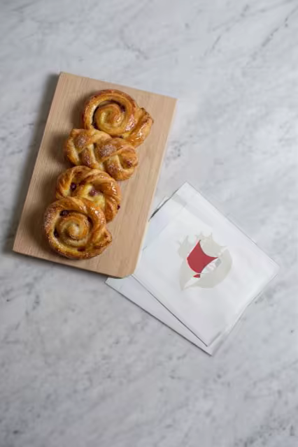 Flat Paper Bag Mockup Beside Pastries on Marble