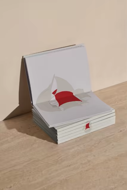 Softcover Stack Mockup on a Travertine Table