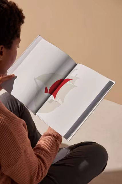 Art Book Mockup Open in a Reader's Hands