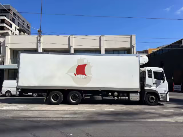 Box Truck Mockup Parked on a Sunny City Street